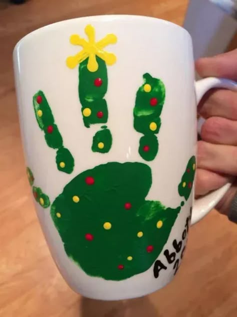 50+ Adorable DIY Christmas Gifts for Grandparents To Melt Their Hearts | HubPages Handprint Gifts For Grandparents Christmas, Infant Holiday Gifts For Parents, Christmas Crafts To Give Parents, Infant Keepsake Ideas, Handprint Christmas Gifts For Parents, Christmas Mug Crafts For Kids, Baby Christmas Gifts For Parents, Christmas Handprint Mug, Diy Christmas Mugs Kids