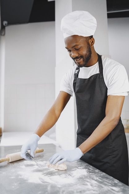 African american baker preparing raw dou... | Free Photo #Freepik #freephoto #dough #food-chef #flour #chef Dough Food, Photography Lighting Techniques, Food Photography Lighting, Food Artists, Kneading Dough, Photography Jobs, Food Advertising, Food Writing, Food Crafts