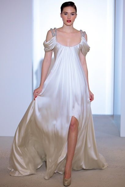 Art Deco inspired long ivory wedding dress with draped peekaboo sleeves & rhinestone straps from Marc Bouwer. Shapeless Dress, Marc Bouwer, Draped Sleeves, High Fashion Dresses, فستان سهرة, Art Deco Inspired, Gorgeous Gowns, Designer Gowns, Beautiful Gowns