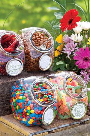 Attach sticker labels to Mason Jar lids to create tags for candy jars. Glad I kept all those leftover lids! Outdoor Movie Party, Wedding Buffet Food, Theater Rooms, Backyard Movie Nights, Candy Station, Communion Party, Mason Jar Lids, Candy Table, Buffet Food