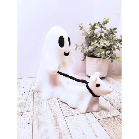 It's what everyone is raving about! 🖤 Bring a Hauntingly Adorable Touch to Your Halloween Decor! 🖤 Meet the latest addition to your Halloween decorations - a delightful 3D Printed Cute Ghost Walking a Ghost Dog! This charming duo is perfect for adding a whimsical and spooky vibe to your home. Whether you're a Halloween enthusiast or just love unique, handcrafted decor, this piece is sure to make you smile. Two size options are currently available. We may be scaling these figures even more... 3d Printed Ghost, Ghost Walk, Ghost Dog, Handcrafted Decor, A Ghost, Viral Post, Cute Ghost, You Smile, Halloween Decor