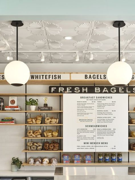 Rosen's Bagels;Lilianne Steckel Interior Design; Bagel shop; white oak store shelving; retail design; cafe design; bagel shop design; light blue and coral; ceiling tile; bagel shelving; order counter; menu board Bagel Shop Design, Coral Ceiling, Bagel Company, Store Shelving, Bagel Cafe, Bagel Breakfast Sandwich, Bakery Design Interior, Breakfast Cafe, Design Cafe