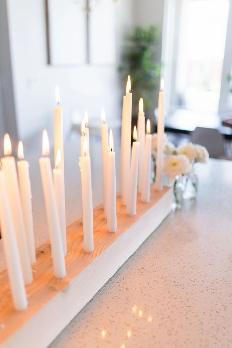 diy taper candle centerpiece Candle Board Diy, Taper Candle Decorating Ideas, Tapered Candle Centerpiece, Wood Candle Centerpiece, Diy Taper Candle Holders, Diy Taper Candles, Diy Candle Centerpieces, Taper Candle Centerpiece, Candle Board