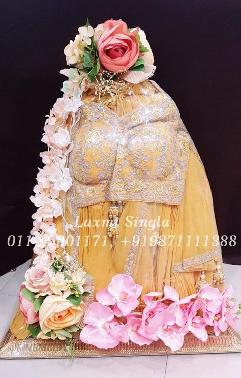 Lehenga Packing  #DecoratedPacking #SareePacking #DesignerSareePacking #ThemePacking #WeddingClothsPacking #LehengaPacking #MehendiDressPacking #HaladiLehengaPacking #CreativePacking #LaxmiSingla ​Contact us : 011-45301171, +91 9871111388 (call & whats app) Wedding Lehenga Packing Ideas, Lehenga Packing Ideas Wedding, Saree Packing, Wedding Packing, Indian Wedding Gifts, Trousseau Packing, Gift Tray, Wedding Entrance Decor, Bridal Gift Wrapping Ideas