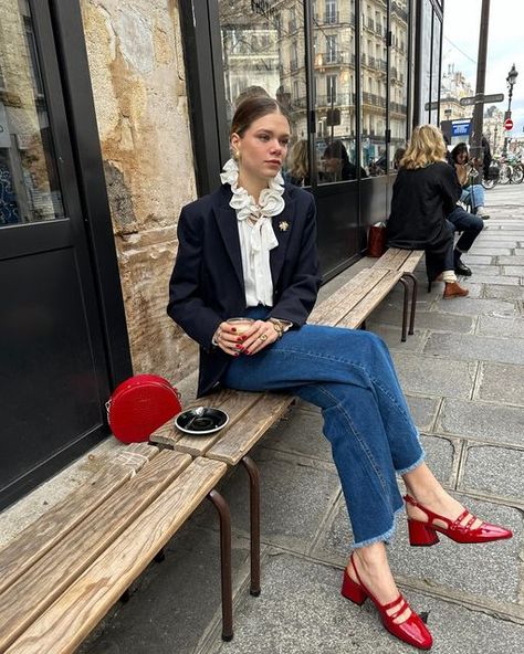 Elodie Romy on Instagram: "My new favorites ( & your favorites ) red shoes + my favorite coffee + my current favorite blouse hihi ❤️ . . #redshoes #maryjaneshoes #effortlesschic #parisianchic effortless chic outfits for winter spring red Mary Jane shoes babies look Paris Parisian coffee"