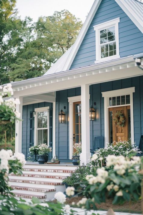 Natural Shingle House Exterior, Blue Farmhouse Exterior White Trim, Blue And Grey House Exterior, Small Blue House Exterior, Chic Exterior House Colors, Best Farmhouse Exterior Paint Colors, Blue House Porch Decor, Blue Roof White House, Cottage Colors Exterior Colour Schemes