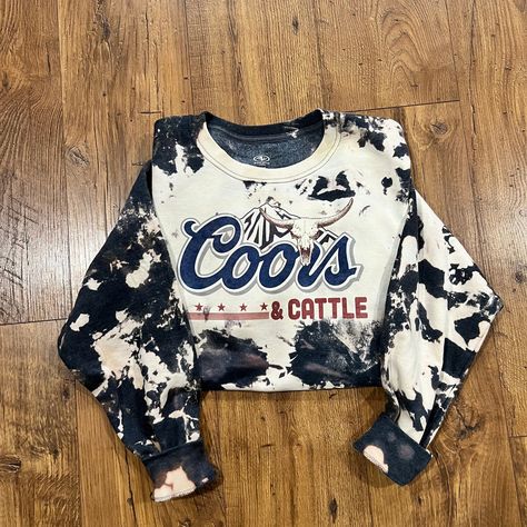 Wrap yourself in rustic charm with our Coors and Cattle Cowhide Sweatshirt, featuring a unique bleached design on a cozy 50/50 blend. This trending sweatshirt is a perfect fusion of style and comfort for cow lovers, farmers, and anyone embracing the allure of the countryside. The cowhide sweatshirts are bleached and no two are the same. Bleached Sweater, Western Hoodies, Casual Country Outfits, Longhorn Cow, Southern Outfits, Country Style Outfits, Western Wear Outfits, Cute Country Outfits, Western Style Outfits