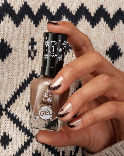 Cozy sweaters and shimmery manis make the perfect holiday match ✨ 

For a holiday nail art look that lasts, discover our new #MiracleGel Once Upon A Time collection. 

Shades used here: 
⭐️Tinsel Time For Two 
🤎 Hot Cocoa Cuddles

#SallyHansen #MiracleGel #holidaynails #frenchtips #nailart #winternails #novembernails November Nails, Holiday Nail, Holiday Nail Art, Sally Hansen, Holiday Nails, Cozy Sweaters, Winter Nails, Hot Cocoa, A Holiday