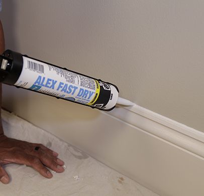 How to Caulk Like the Pros | DAP Global How To Caulk Like A Pro, Caulking Trim, Bathroom Baseboard, Caulk Baseboards, Caulking Tips, Caulking Tools, Baseboard Trim, Silicone Caulk, Paint Tips