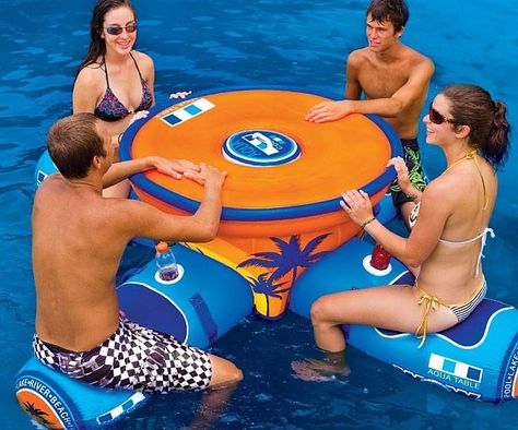 Turn any watering hole into an instant oasis with the floating aquatic table. This all inclusive structure comfortably sits up to four people and provides a sturdy table great for hosting aquatic picnics or playing drinking games while relaxing in the water. Inflatable Pool Toys, Lake Fun, Pool Floats, Pool Toys, Inflatable Pool, Water Toys, Backstreet Boys, Cool Inventions, Cool Pools