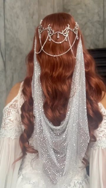 FIREFLY PATH Couture Designer on Instagram: "✨ Ethereal Wedding Veil ✨ Bring a touch of fantasy to your special day with this stunning wedding veil. The design features delicate silver metal branches adorned with shimmering rhinestone fabric, perfect for creating an ethereal look for your elf-inspired wedding.🧝‍♀️✨ Model @milynnmoon #elven #weddingveil #elfwedding #elfcore #ethereal #fairytalewedding #glitter #sparkle #shimmer" Wedding Looks With Veil, Elvish Inspired Wedding Dress, Fantasy Wedding Dress Elves, Elf Princess Wedding Dress, Celestial Wedding Dress With Sleeves, Wedding Hair Down Headpiece, Wedding Veil Cloak, Glitter Hair Wedding, Elven Wedding Veil