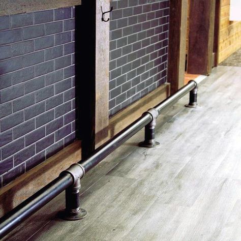 Top 40 Best Bar Foot Rail Ideas - Home Saloon Designs Bar Foot Rail Ideas, Saloon Designs, Silo Bar, Building A Bar, Wrought Iron Scrollwork, Bar Foot Rail, Industrial Shelves, Banquette Seating In Kitchen, Bar Counter Design