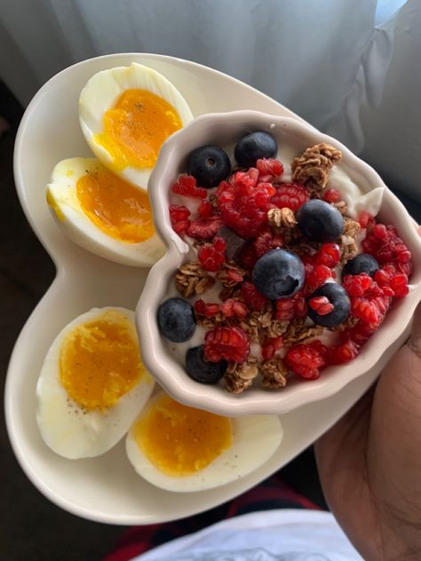 2 soft boiled eggs with a greek yogurt parfait topped with blueberries, raspberries and granola Eggs And Yogurt Breakfast, Soft Boiled Eggs Breakfast Ideas, Boiled Egg Breakfast Ideas, Greek Yogurt Recipes Breakfast, Greek Yogurt And Fruit, Yogurt Recipes Breakfast, Greek Yogurt Breakfast, Healthy Breakfast Idea, Greek Yogurt Parfait