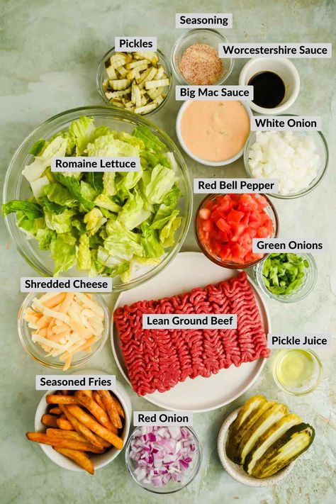 Enjoy this delicious Burger Bowl Recipe which features layers of seasoned ground beef, fresh lettuce, juicy tomatoes, and crisp pickles, all drizzled with a tangy special sauce. This low-carb alternative to a traditional burger is both flavorful and satisfying. Bacon Burger Bowl, Fiesta Burger Bowl, Ground Beef Meal Ideas Healthy, Protein Bowl Sauces, Cheese Burger Bowl Recipe, Burger Bowls Sauce, Meals With Lettuce, Animal Style Burger Bowl, Burger Bowl Sauce Recipe