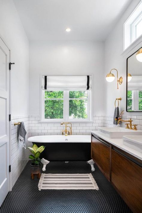 Black and White Modern Farmhouse Bathroom with Black and White Clawfoot Tub  #bathroom #bathroomdecor #bathroomdecorideas #bathroomdecoratingideas #bathroomideas #bathroomdesign #farmhousebathroom #farmhousebathroomdecor #modernfarmhousebathroom Black And White Clawfoot Tub, White Modern Farmhouse Bathroom, White Clawfoot Tub, Black And White Modern Farmhouse, Bathroom Black And White, Modern Farmhouse Bathroom Ideas, Clawfoot Tubs, Black Bathtub, Black Tub