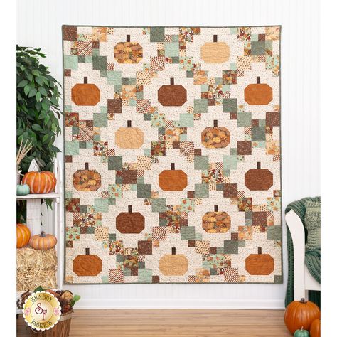 Bring the festive fun of the farm to your home with the Pumpkin Patches quilt, designed by Cluck Cluck Sew and colored using the gentle Hello Autumn collection from Maywood Studio. Featuring dynamic rows of patchwork and pumpkin blocks in complementary fall colors, this quilt will bring a touch of autumn elegance to any space. Quilt finishes to approximately 60" x 72". This lovely project is perfect for beginners and seasoned quilters alike. Kit Includes Pattern All fabrics for Top including binding FREE U.S. Shipping! Forest Animals Quilt Patterns, Brightly Quilt Pattern By Cluck Cluck Sew, Easy Fall Quilt Patterns Free, Cluck Cluck Sew Patterns, Fall Quilt Ideas, Fall Quilt Blocks, Book Quilt Pattern, Brightly Quilt, Pumpkin Quilts