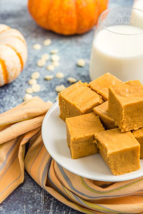 Homemade recipe for pumpkin pie fudge. This pumpkin fudge is soft and sweet and perfect for Thanksgiving and other fall celebrations. #pumpkinfudge #pumpkinpiefudge #pumpkindesserts #pumpkinrecipes #pumpkinspicefudge #pumpkinspicerecipes #amandascookin #thanksgivingdessert #thanksgivingrecipes #fudgerecipes Pumpkin Pie Fudge, Fudge Squares, Pumpkin Oatmeal Pancakes, Pumpkin Magic Cake, Finger Food Desserts, Paleo Pumpkin Pie, Pumpkin Fudge, Comfort Desserts, Pumpkin Pie Bars