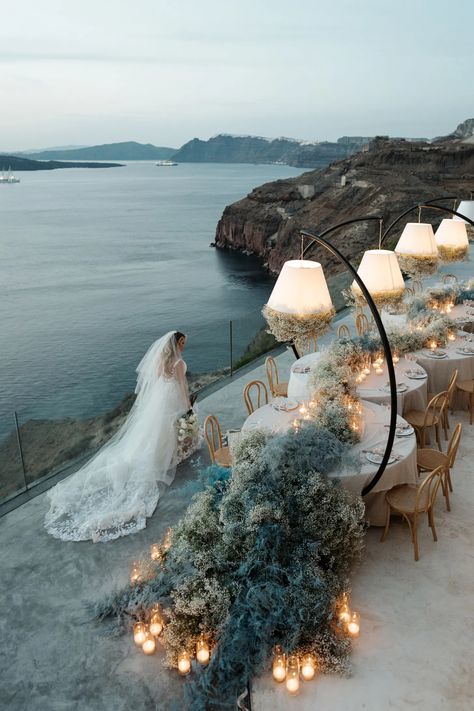 The Stunning Flowers Were The “Something Blue” at This Dreamy Santorini Destination Wedding Wedding Venues Santorini, Intimate Wedding Destinations, Japan Destination Wedding, Dubai Wedding Decoration, Le Ciel Santorini Wedding, St Tropez Wedding, Wedding Inspo 2024, Wedding Ideas Decoracion, Wedding Venue Greece