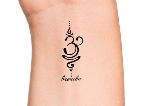 "Breathe Sanskrit Lotus Temporary Tattoo Size: The size of this Temporary Tattoo is approximately 1 1/2 inches in length. If you would like this design in a smaller or larger size that isn't listed, please message me on Etsy and I would be more than happy to accommodate you. Directions: 1. Cut excess paper around tattoo with scissors to eliminate any unnecessary adhesive on your skin after applying. 2. Peel away and discard the clear plastic layer. 3. Apply the tattoo image side to your skin and Breathe Sanskrit, Just Breathe Tattoo, Yoga Tattoos, Sanskrit Tattoo, Tattoos Infinity, Petit Tattoo, Tattoos Mandala, Tasteful Tattoos, Inspiration Tattoo