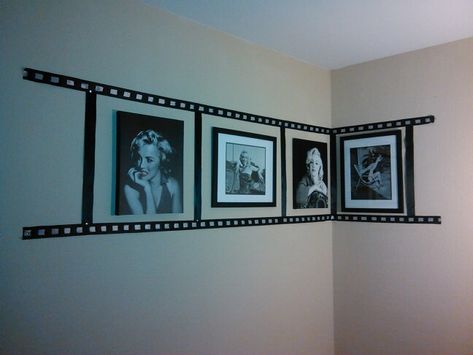 Photo reel collage made with black and white ribbon and a few of my fav Marilyn Monroe picture frames... Gives an amazing look in my living room next to my other collections! Movie Theme Decor Room Ideas, Filmmaker Room Ideas, Marilyn Monroe Living Room Ideas, Cinema Themed Living Room, Marilyn Monroe Aesthetic Bedroom, Hollywood Room Ideas, Movie Themed Living Room Ideas, Marilyn Monroe Room Ideas Bedrooms, Marilyn Monroe Home Decor