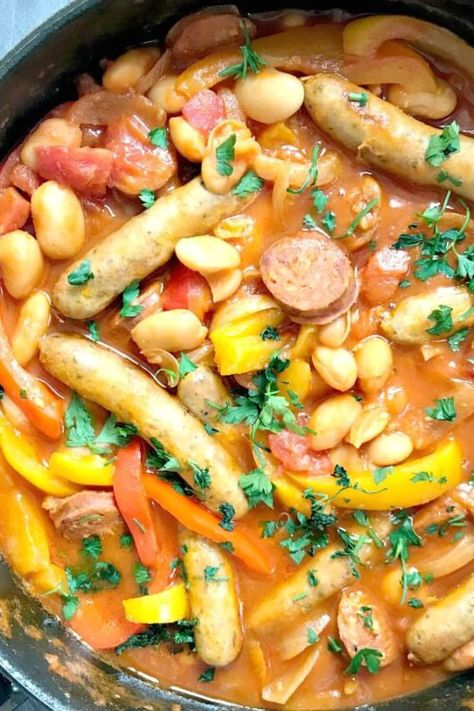 Sausage and Butter Bean Casserole, a hearty dish for an epic family dinner. Made with chipolatas sausages, chorizo, butter beans, and peppers, simmered in a rich tomato sauce, this simple sausage casserole is a big hit every single time. That's what I call comfort food! My sausage and bean casserole can be enjoyed by the whole family no matter the season, it's hearty and filling, but so so nutritious and delicious.#casserole, #sausagebeancasserole, #comfortfood, #chorizo, #chipolatassausages Chicken Casserole Recipes Easy, Butter Bean Casserole, Chorizo Butter, Chicken Casserole Recipes For Dinner, Sausage Casserole Slow Cooker, Casserole Recipes Easy, Easy Sausage Casserole, Sausage And Bean Casserole, Casserole Recipes For Dinner