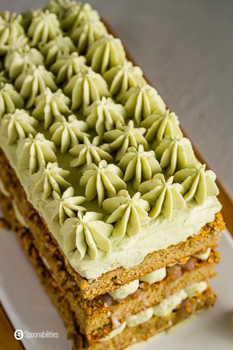 Pistachio Tiramisu Cake is a layered sponge cake recipe filled with pistachio whipped mascarpone cream and brought to life with aromatic cardamom syrup that is homage to Italian desserts and Persian flavors. A creamy, nutty, and sweet dessert, this beautiful cake is layered with sophisticated yet comforting flavors. Learn the simple 4 step process of how to make Pistachio Tiramisu Cake. #tiramisu #pistachio #pistachiocake #tiramisucake #cakedecorating #italiandessert #persiandessert Pistachio Mascarpone Cream, Matcha Pistachio Cake, Desserts With Pistachio Cream, Pistachio Whipped Cream, Christmas Pistachio Dessert, Desserts With Pistachios, Pistachio Cream Recipe Desserts, Pistachio Cream Dessert, Pistachio Cake Filling