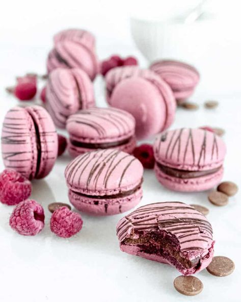 Okay, so I’m in the middle of compiling a whole list of dos-and-dont’s of macarons just because I’m tired of seeing all these “advice” online that doesn’t really help anyone at all. It’s just guesswork. Macarons are hard to make the first time around. Know why? There’s only four ingredients to make it, so method... Read More The post Raspberry Chocolate Macarons appeared first on Kitchenlicious. Raspberry Macaron Recipes, Winter Macaron Flavors, Christmas Macaron Flavors, Valentine’s Day Macarons, Chocolate Raspberry Macarons, Macarons Raspberry, Macaroons Flavors, Raspberry Macaroons, French Macaroon Recipes