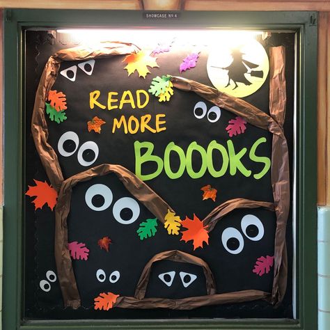 Fall Reading Door Decorations, October Library Bulletin Board Ideas, Monthly Library Themes Book Displays, Halloween Decorations For Library, Library Halloween Bulletin Boards, Fall Bulletin Boards For Library, October Bulletin Boards Elementary, Fall Reading Bulletin Boards, October Library Bulletin Boards