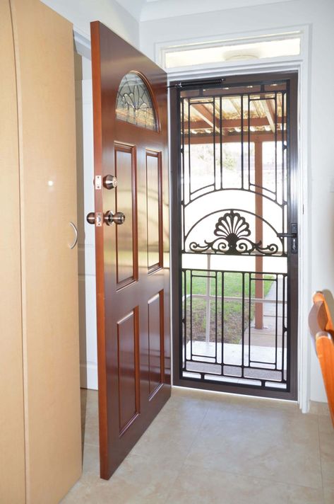 Doors Plus-External-Entrance-Nubreeze-Safety screen hinged door-with grill design on it-in black finish Safety Door Design Entrance Grill, Safety Door Grill Design, Safety Door Design Entrance, Screen Door Grill, Safety Door Design, Door Design Entrance, Fly Screen Doors, Sliding Screen Door, Net Door