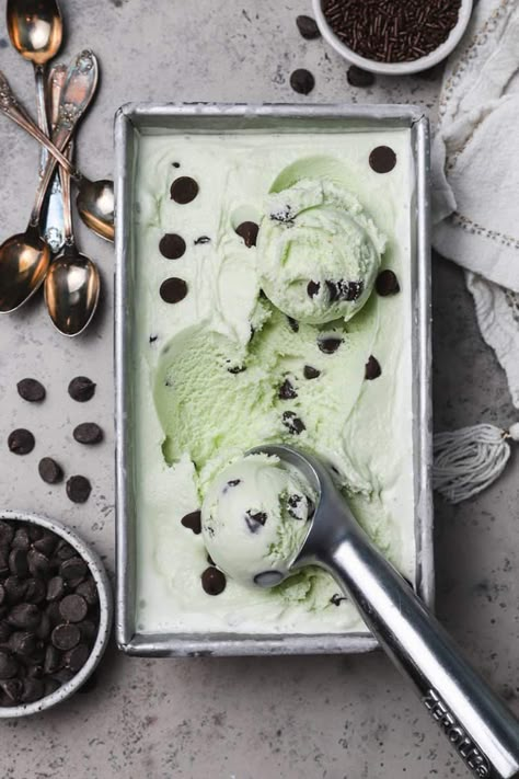 Mint chocolate chip ice cream in a loaf pan with scoops coming out. Homemade Mint Chocolate Chip Ice Cream, Mint Chocolate Ice Cream, Brown Eyed Baker, Custard Ice Cream, Mint Chip Ice Cream, Andes Mint, Mint Chocolate Chip Ice Cream, Mint Ice Cream, Mint Chocolate Chip