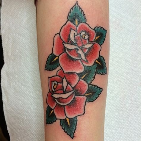 Double, traditional-style rose tattoo Double Rose Tattoo, Traditional Rose Tattoo, Rose Tattoo Meaning, Traditional Tattoo Flowers, Traditional Rose, Double Rose, Saved Tattoo, Traditional Tattoo Sleeve, Omerta Tattoo