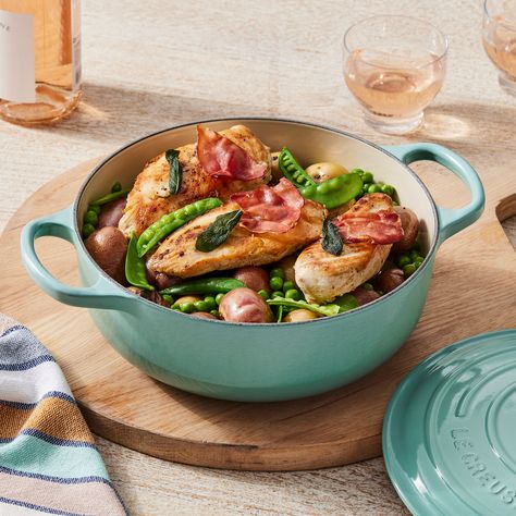 This colorful meal incorporates the classic flavors of chicken saltimbocca with fresh spring vegetables for a hearty dinner ready in under an hour. Fragrant sage leaves and prosciutto are crisped in butter and olive oil, infusing the entire dish with a rich, herbal flavor that is reinforced when they are added as a garnish at the end. This recipe is a true one-pot dish, inspired by a classic Italian flavor combination and elevated to a complete entree, as good as a weeknight meal. Le Creuset Pots, Healthy Skillet Meals, Short Rib Stew, Sage Chicken, Le Creuset Recipes, Chicken Saltimbocca, Goat Cheese Pasta, Enamel Pan, Roasted Fennel