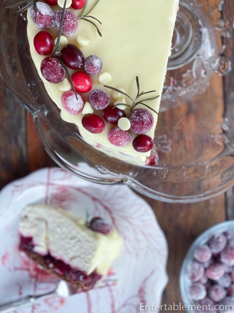 White Chocolate Cranberry Orange Cheesecake | Entertablement Orange Cranberry Cheesecake, Cheesecake Condensed Milk, Cranberry Orange Desserts, White Chocolate Cranberry Cheesecake, Cranberry White Chocolate Cheesecake, Cranberry Orange Cheesecake, Orange Cheesecake, Orange Dessert, Rich Cheesecake