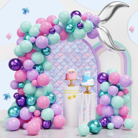 PRICES MAY VARY. 【DIY Balloons Package List】: The Mermaid balloon arch come with 122pcs different size pink teal purple balloons, including 3 different sizes: light purple balloons x 30pcs, light pink balloons x 30pcs, light teal balloons x 30pcs, metallic green balloons x 15pcs, metallic purple balloons x 15pcs, silver tail foil balloons x 2pcs, Balloon garland strip x 1 roll (16 feet) and 100pcs balloon glue dots. The mermaid theme backdrop is very beautiful and stylish. You can DIY your merma Mermaid Balloon Arch, Pink Purple Party, Mermaid Backdrop, Teal Balloons, Teal Mermaid, Mermaid Birthday Decorations, Mermaid Balloons, Green Balloons, Balloon Arch Kit