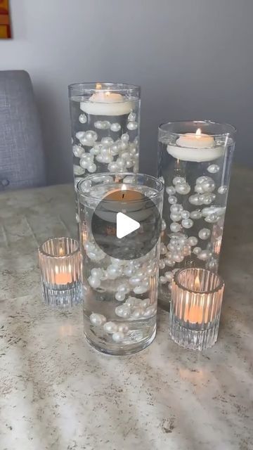 Floating Pearls For Vases, Water Beads Centerpiece Wedding, Diy Anniversary Decorations At Home, Pearl Table Decor, Floating Pearls Centerpiece, Pearl Anniversary Party, Mirror Centerpiece Ideas, Pearl Candle Centerpiece, Water Pearls Centerpiece