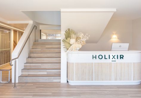 Now Open in Balgowlah: Holixir, An All-in-One Women’s Wellness Space Wellness Interior Design, White Reception Desk, Wood Reception, Client Consultation, Women Wellness, Wood Reception Desk, Pilates Machines, Calming Interiors, Wellness Space