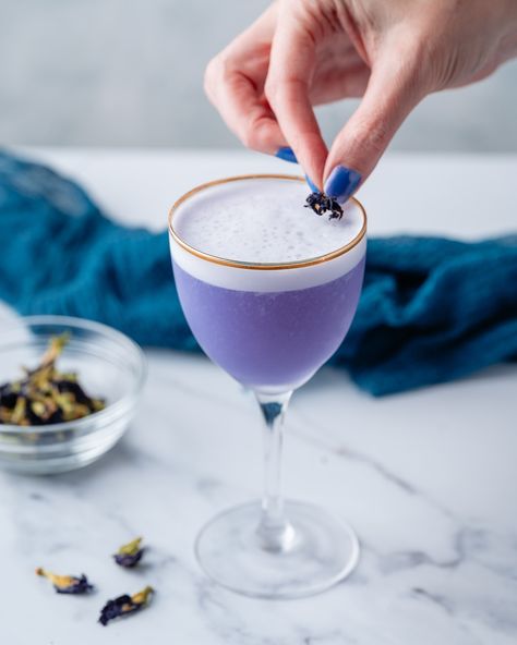 Purple Haze All in my eyes. Try not to get the song stuck in your head. Good luck. PURPLE HAZE 2 oz. butterfly pea flower-infused gin 3/4 oz. lemon juice 1/2 oz. simple syrup egg white Shake then strain into Nick & Nora glass. Garnish with dried butterfly pea flowers. Get your dried butterfly pea flowers @selefina.spices, along with whatever other spices you could possibly need to make infusions and syrups. I have a whole mixology section on their site with recipes, including this one. ... Blue Pea Flower Cocktail, Song Stuck In Your Head, Dried Butterfly, Butterfly Pea Flowers, Purple Cocktails, Infused Gin, Glass Garnish, Nick And Nora, Cocktail Garnish