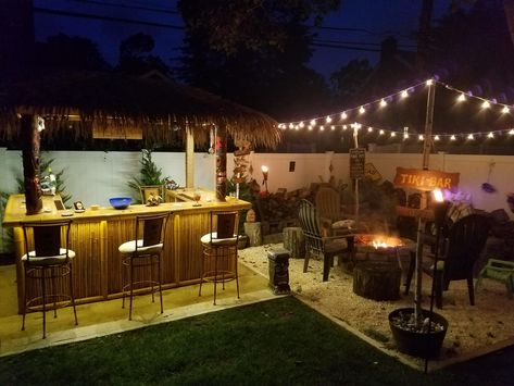 Fire Pit Bar Area, Bar Area Backyard, Backyard Tiki Bar Ideas Patio, Outdoor Bar And Fire Pit, Backyard Bar And Fire Pit, Outside Tiki Bar Ideas, Fire Pit And Bar Ideas Backyard, Outdoor Bar Fire Pit, Garden Tiki Bar