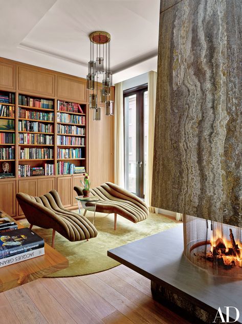 Inside Decorator Laura Santos’s Sprawling Five-Story Manhattan Townhouse | Architectural Digest Manhattan Townhouse, Fireplace Marble, West Village Townhouse, New York Townhouse, Contemporary Office, Warm Tone, Home Libraries, Cozy Reading Nook, Celebrity Houses