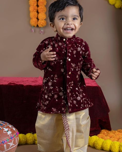 Grace, not restricted to girls! Maroon and Gold Dhoti Ethnic Wear for Baby Boy Instock: 0-3 Years SHOP on www.babynmeindia.com 🔎 Product Link: MAROONGOLDKD Baby Boy Dress Design, Baby Boy Ethnic Wear, Wedding Dress For Boys, Athangudi Tiles, Ethnic Wear For Boys, Boys Party Wear, Stylish Boy Clothes, Kids Indian Wear, Kids Dress Boys