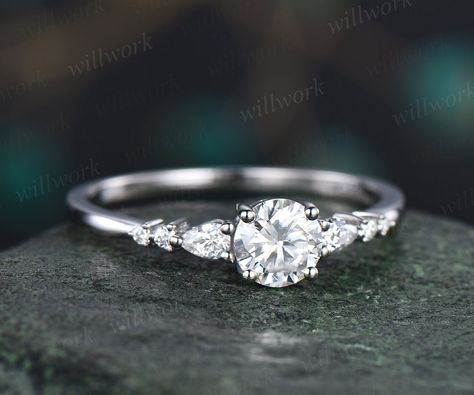 This ring is handmade by myself. The main stone in the picture is a 5mm round cut moissanite,about 0.5ct. The accent stones are diamonds or moissanites. The material is solid 14k gold(white,yellow,rose gold is also available) Ring size can be choose from the selection box. Matching band available: https://www.etsy.com/shop/willwork?section_id=20674906 This jewelry can also be made in solid 10k,14k,18k gold,with real diamonds.Contact me! Need rush order? contact me! Need custom making order? Cont Minimalistic Engagement Ring Silver, Dainty Silver Engagement Rings, Dainty Engagement Ring Silver, Simple Silver Engagement Rings, Minimalist Engagement Ring Silver, Engagement Rings Dainty, Snowdrift Ring, Vintage Moissanite Engagement Ring, Wedding Ring Women