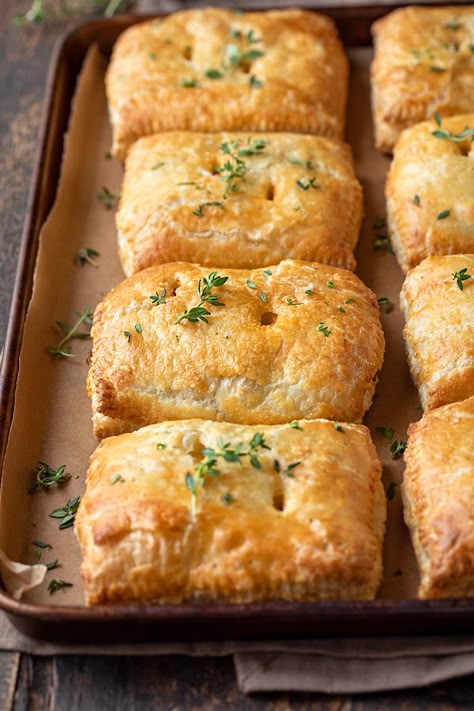 Hot and flaky, these savory hand pies are brimming with a rich, saucy filling of ground beef, diced potatoes, veggies and fresh thyme! | thecozyapron.com #savoryhandpies #savoryhandpiesrecipes #savoryhandpieseasy #savoryhandpiesmeat #savoryhandpieswithpremadepiecrust Savory Hand Pie, Savory Hand Pies Recipes, Savory Hand Pies, Hand Pies Savory, Beef Pies, Hand Pie Recipes, Hand Pie, Diced Potatoes, Beef Stock