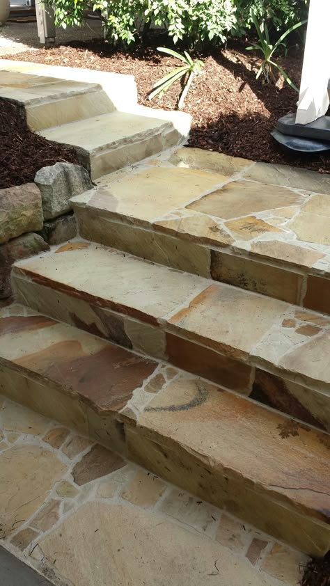 Sandstone Crazy Paving steps in Brisbane. Follow EcoBuilt Carpentry and Landscaping on Facebook Crazy Paving Stairs, Sandstone Crazy Paving, Paved Verandah, Paving Design Landscape, Crazy Tiles, Terrace Steps, Crazy Pave, Slatted Fence, Curved Stairs