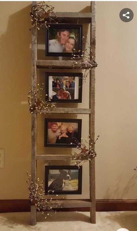 Wooden Ladder Picture Display, Wood Ladder Decor Ideas, What To Do With Old Wooden Ladders, Western Ladder Decor, Diy Primitive Decor Living Room, Decorative Ladders Ideas, Decorated Ladders Ideas, Old Ladders Ideas Decor, Farmhouse Picture Wall Ideas