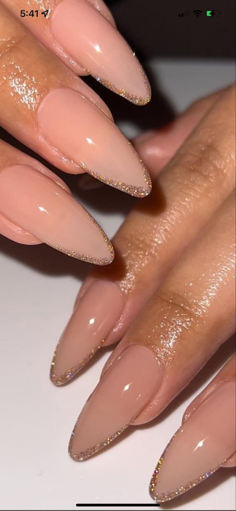 French Tip Acrylic Nails Champagne, Sparkle Tip Nails Almond, Simple But Cute Almond Nails, Almond Nails With Outline, Beige With Glitter Nails, Simple Glitter Almond Nails, Short Almond Nails Beige, French Champagne Nails, Almond Rose Gold Nails