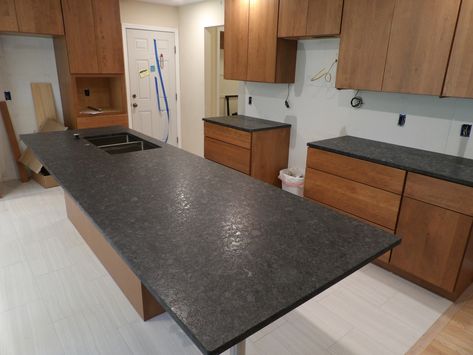 Did you know our remarkable worktops are expertly designed, measured and then fitted to simply overlay on top of your existing surfaces, it’s very simple!  Take a look at emeraldgranite.com or call 610 432 1111 !!!  Material:Steel Grey Leathered  #customcountertops #customcabinetry #granite #granitecountertops #quartzitecountertops #customkitchen #homedesign #naturalstones #countertops #modernkitchen #kitchendesign #kitchens #kitchen #bethlehem #emeraldgranite #emeraldgranitepa #pennsylvania Steel Grey Brushed Granite Countertops, Black Leather Countertops, Steel Grey Leathered Granite Countertops, Steel Grey Leathered Granite, Steel Grey Granite Countertops, Dark Grey Countertops, Black Leathered Granite Countertops, Black Laminate Countertops, Steel Grey Granite