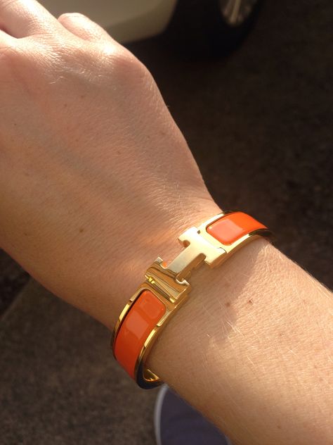 Orange Hermes click clack bracelet.. Birthday pressie! Hermes Clip Bracelet, Hermes Orange Bracelet, Hermes Clic H Bracelet Orange, Click H Bracelet Hermes, Hermes Click Clack Bracelet, Hermes Bracelet Outfit, Hermes H Bracelet, Bracelet Hermes, Bracelets Outfit