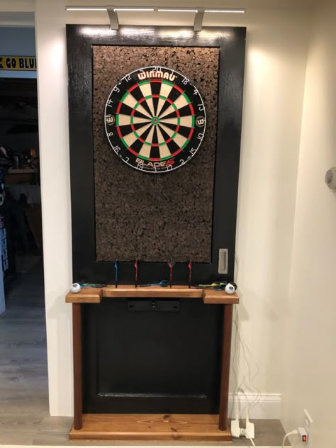 Dart Board Area Ideas, Dart Board Set Up, Indoor Dart Board Wall, Modern Dart Board Wall, Hidden Dart Board Ideas, Dart Room Ideas, Electronic Dart Board Cabinet, Dart Board Ideas, Dart Board Wall Ideas