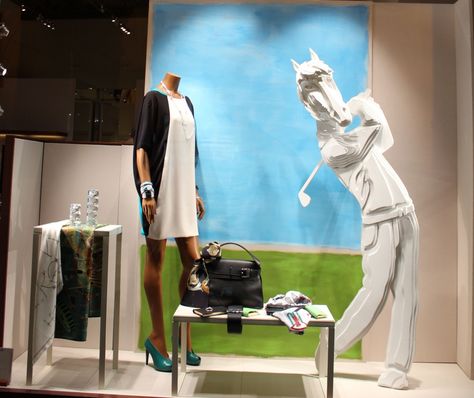 Hermés in Bologna,Italy,"GOLF:is a precision club and ball sport in which competing players hit balls in a series of holes on a course using the fewest number of strokes", pinned by Ton van der Veer Shop Merchandising, Hermes Window, Mannequin For Sale, Retail Windows, Bologna Italy, Golf Shop, Window Dressing, Window Dressings, Window Displays