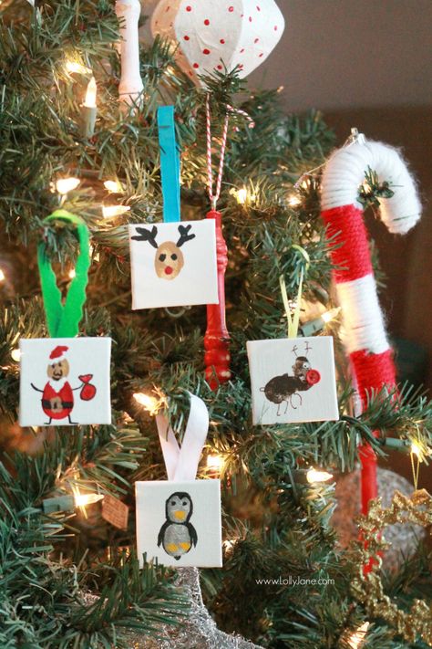 ADORABLE mini canvas thumbprint ornaments! SO EASY to make, kids have fun crafting and you get a Christmas keepsake for years to come. Great Christmas kids craft and Christmas gift idea! Thumbprint Ornaments, School Holiday Crafts, Christmas Party Activities, School Christmas Party, Preschool Christmas Crafts, Christmas School, Christmas Crafts For Gifts, Preschool Christmas, Christmas Kids